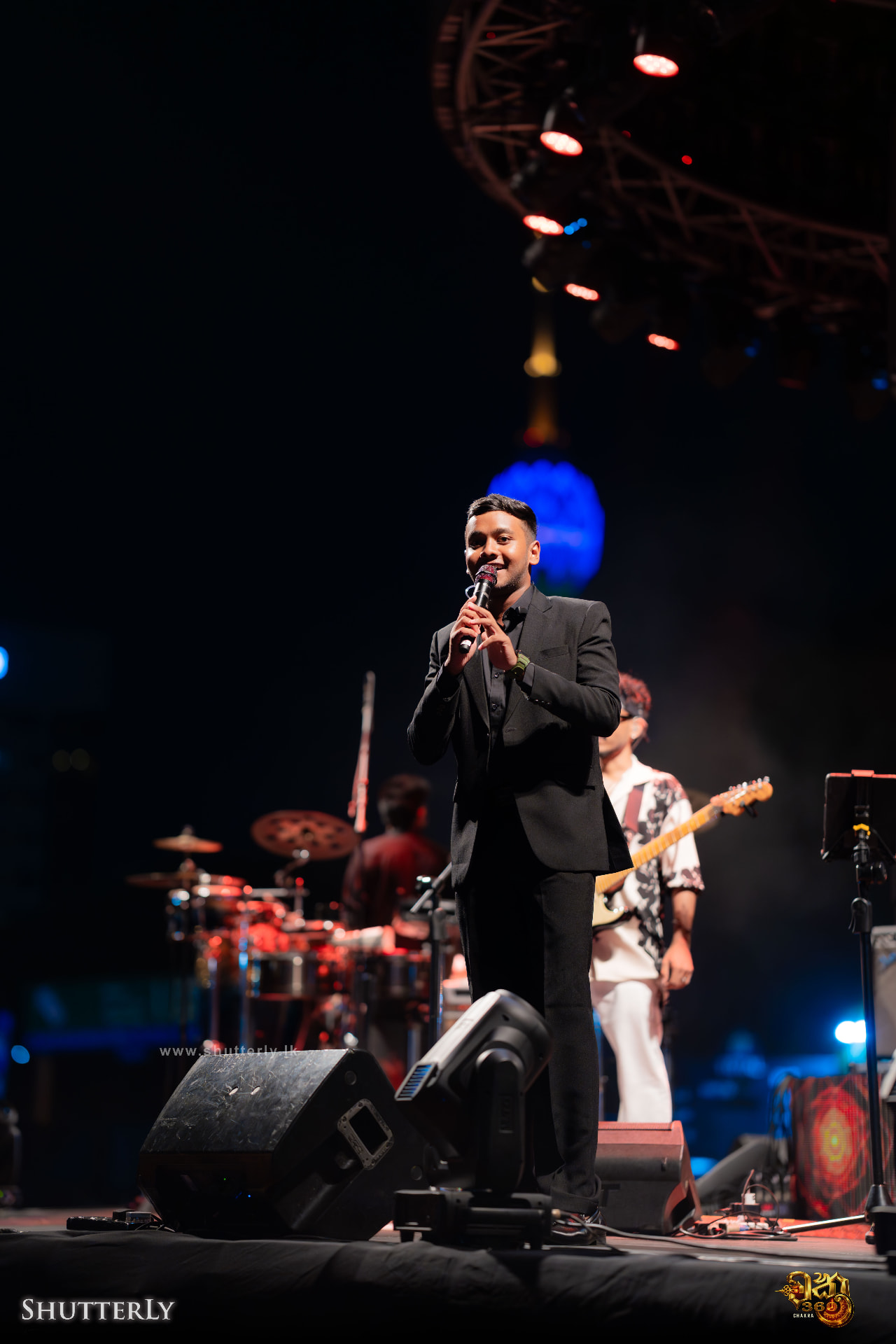 Chanuka Gimsara hosting a live concert on stage